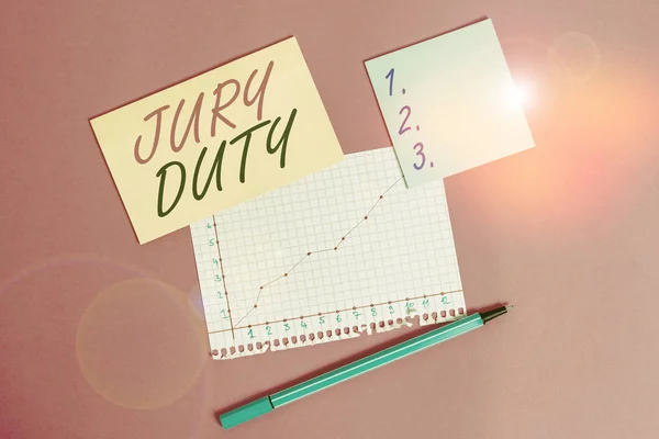 Writing note showing Jury Duty. Business photo showcasing obligation or a period of acting as a member of a jury in court Stationary and note paper math sheet with diagram picture on the table. — 스톡 사진