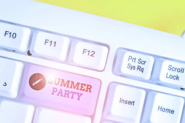 Writing note showing Summer Party. Business photo showcasing social gathering held during summer season or school break White pc keyboard with note paper above the white background.