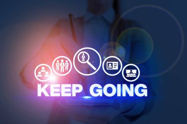 Handwriting text Keep Going. Concept meaning make an effort to live normally when in a difficult situation.