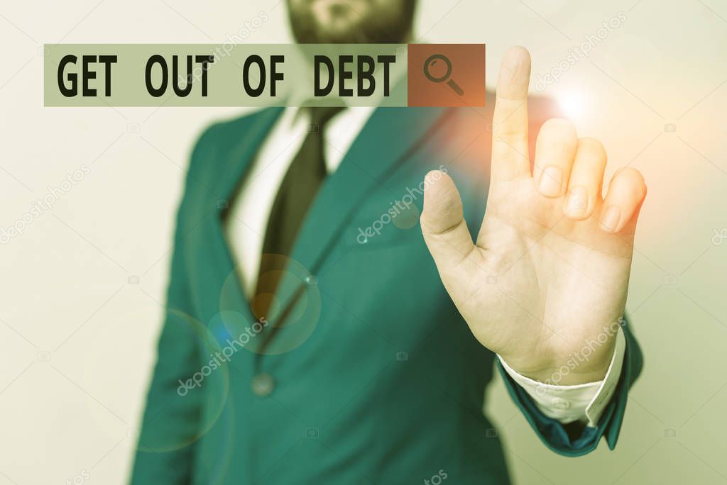 Text sign showing Get Out Of Debt. Conceptual photo No prospect of being paid any more and free from debt Businessman with pointing finger in front of him.