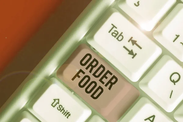 Word writing text Order Food. Business concept for the process of requesting a preferred food in a restaurant.