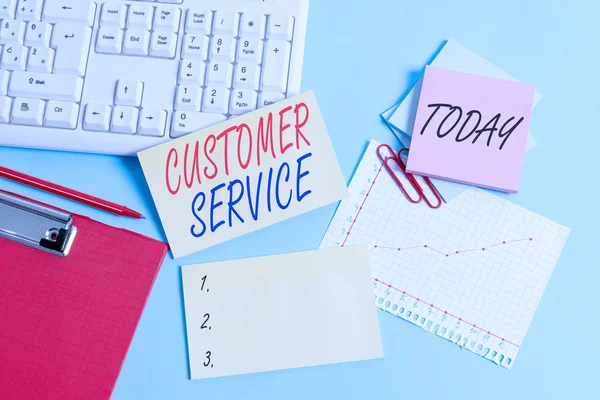 Text sign showing Customer Service. Conceptual photo process of ensuring customer satisfaction with a product Paper blue desk computer keyboard office study notebook chart numbers memo. — Stock Photo, Image