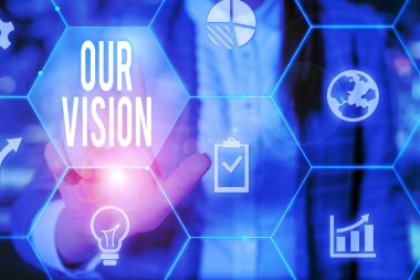 Text sign showing Our Vision. Conceptual photo plan for next five to ten years about company goals to be made Female human wear formal work suit presenting presentation use smart device.