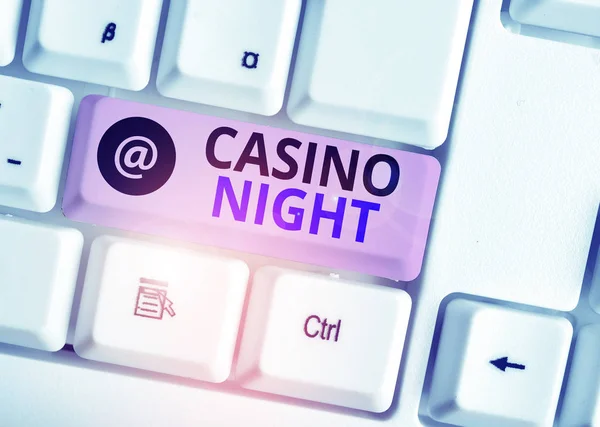 Word writing text Casino Night. Business concept for event where can experience the fun playing in a real casino White pc keyboard with empty note paper above white background key copy space.