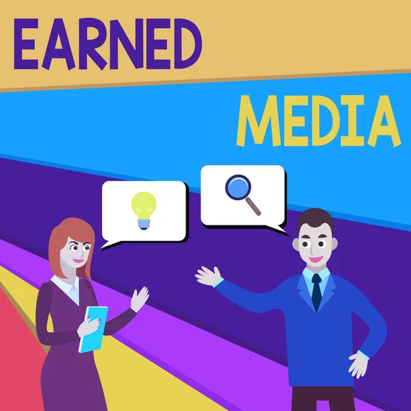 Text sign showing Earned Media. Conceptual photo publicity gained through promotional efforts other than paid Business Partners Colleagues Jointly Seeking Problem Solution Generate Idea.