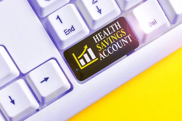 Conceptual hand writing showing Health Savings Account. Business photo text users with High Deductible Health Insurance Policy White pc keyboard with note paper above the white background. — Stock fotografie