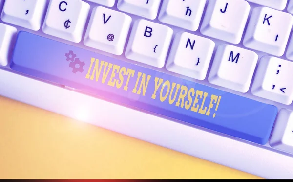 Text sign showing Invest In Yourself. Conceptual photo nvesting in a coach or a training to learn new things White pc keyboard with empty note paper above white background key copy space.