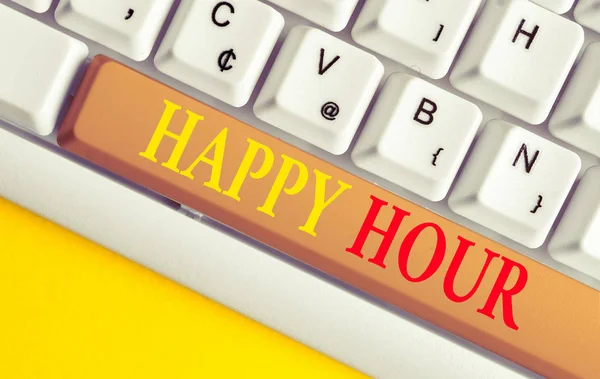 Conceptual hand writing showing Happy Hour. Business photo showcasing Spending time for activities that makes you relax for a while White pc keyboard with note paper above the white background.