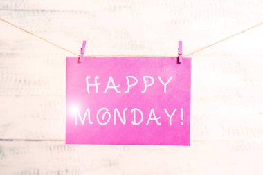 Kelime yazma metin Happy Monday. Ona büyük yeni hafta Clothesline clothesline clothespin dikdörtgen şekilli kağıt hatırlatma beyaz ahşap masa dilemek için sipariş gösteren söylemek için iş konsepti.