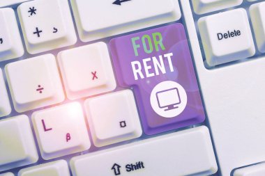 Kiralık'ı gösteren metin işareti. Beyaz arka plan tuşu kopyalama alanının üzerinde boş not kağıdı ile geçici olarak Beyaz pc klavye satın almak için özellik kullanılabilir hale kavramsal fotoğraf.