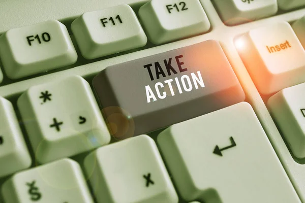 Word writing text Take Action. Business concept for to do somethingoract in order to get a particular result White pc keyboard with empty note paper above white background key copy space. — Stock Photo, Image