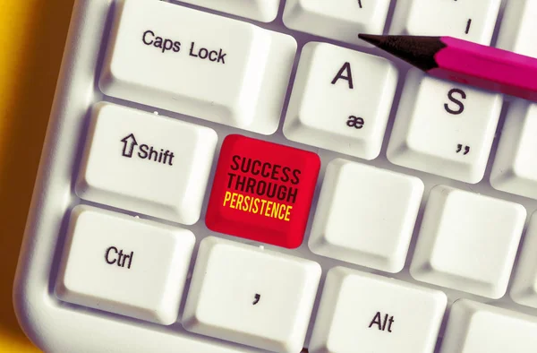 Text sign showing Success Through Persistence. Conceptual photo never give up in order to reach achieve dreams White pc keyboard with empty note paper above white background key copy space.