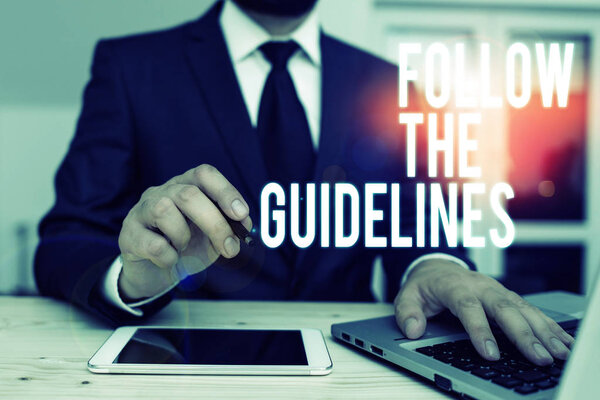 Handwriting text writing Follow The Guidelines. Concept meaning Manual of Style Follow a Specified Rule Accordingly.