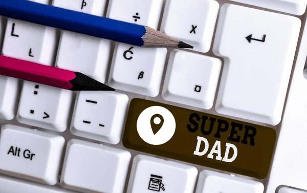 Handwriting text Super Dad. Concept meaning Children idol and super hero an inspiration to look upon to White pc keyboard with empty note paper above white background key copy space.
