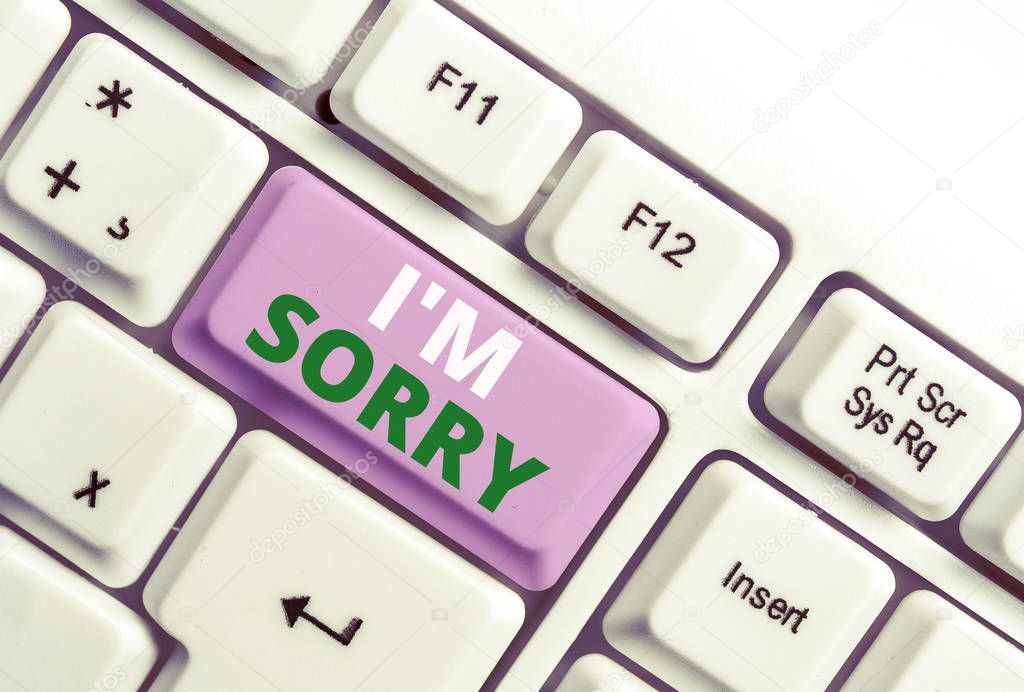 Text sign showing I M Sorry. Conceptual photo Toask for forgiveness to someone you unintensionaly hurt White pc keyboard with empty note paper above white background key copy space.