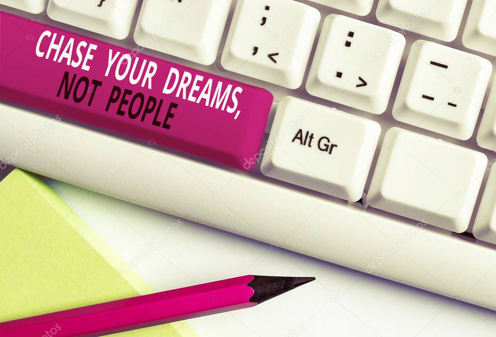 Conceptual hand writing showing Chase Your Dreams Not People. Business photo text Do not follow others chasing goals objectives White pc keyboard with note paper above the white background.