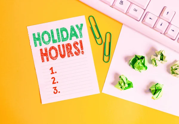 Escritura a mano conceptual que muestra las Horas de Navidad. Texto de la foto del negocio Trabajo de horas extras para los empleados bajo horarios de trabajo flexibles Colocación plana con espacio de copia Libro blanco con clips de papel sobre la mesa . — Foto de Stock