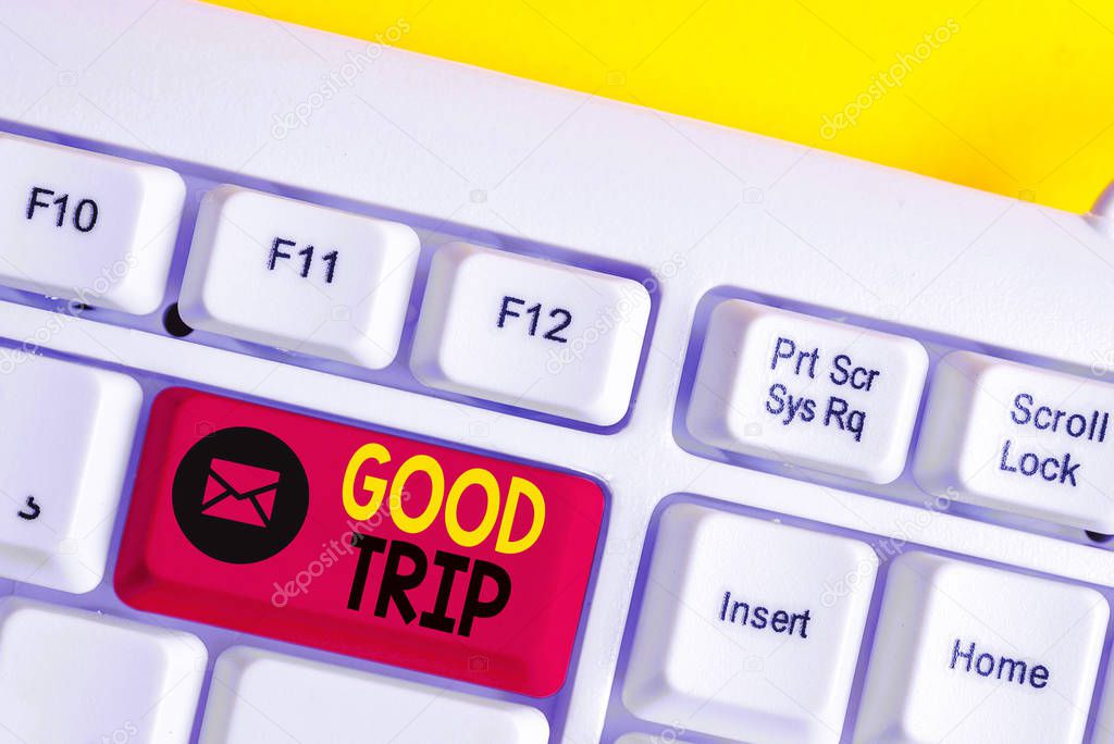 Text sign showing Good Trip. Conceptual photo A journey or voyage,run by boat,train,bus,or any kind of vehicle White pc keyboard with empty note paper above white background key copy space.