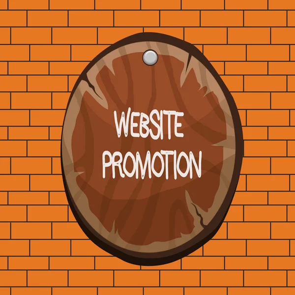 Text sign showing Website Promotion. Conceptual photo increase exposure of a website to bring more visitors Oval plank rounded pinned wooden board circle shaped wood nailed background.