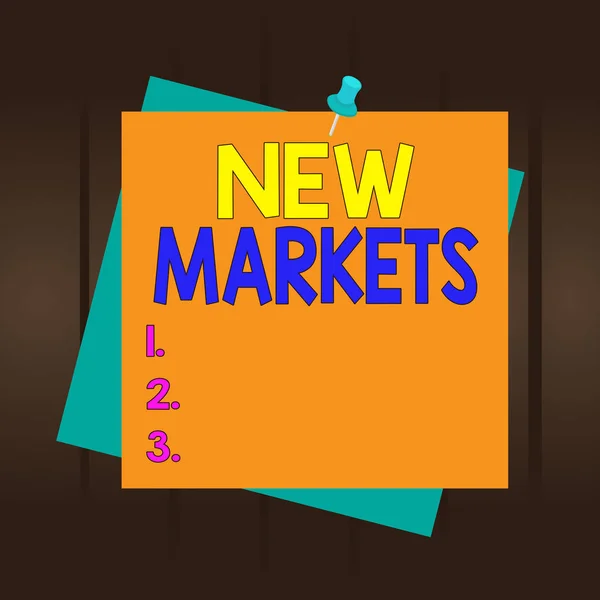 Writing note showing New Markets. Business photo showcasing market where the end product or service is new or not exist yet Reminder color background thumbtack tack memo pin square.