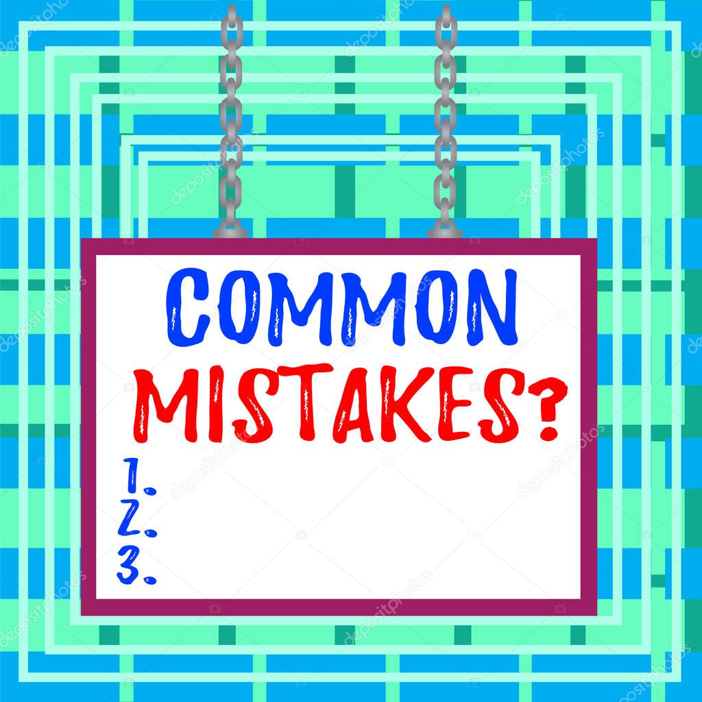 Text sign showing Common Mistakes question. Conceptual photo repeat act or judgement misguided or wrong Whiteboard rectangle frame empty space attached surface chain blank panel.