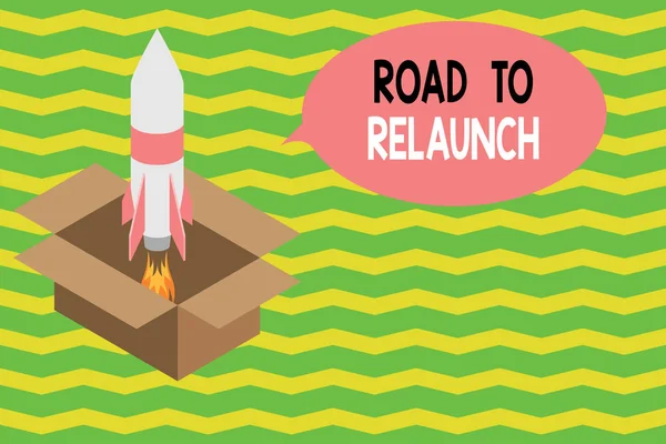 Word writing text Road To Relaunch. Business concept for In the way to launch again Fresh new start Beginning Fire launching rocket carton box. Starting up project. Fuel inspiration. — Stockfoto