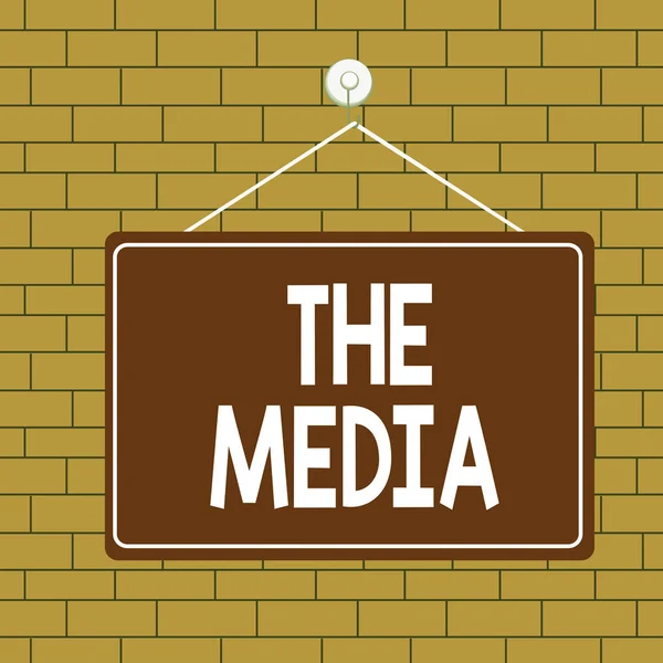Text sign showing The Media. Conceptual photo main means of mass communication that are regarded collectively Colored memo reminder empty board blank space attach background rectangle. — Stock Photo, Image