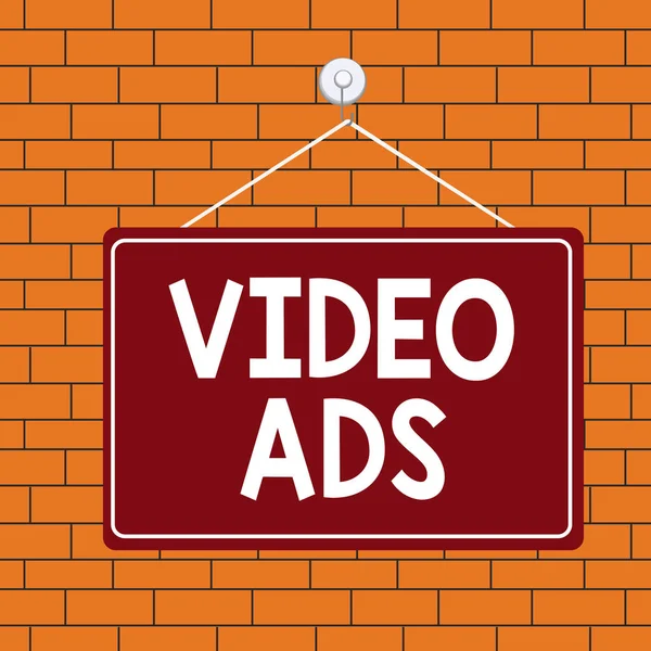 Text sign showing Video Ads. Conceptual photo Engage audience in the form of video content advertising Colored memo reminder empty board blank space attach background rectangle. — Stock Photo, Image