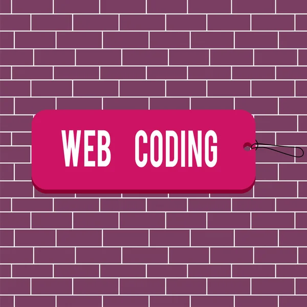 Text sign showing Web Coding. Conceptual photo work involved in developing a web site for the Internet Label tag badge rectangle shaped empty space string colorful background.