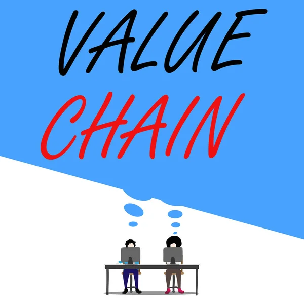 Text sign showing Value Chain. Conceptual photo process or activities by which company adds value to an article Man with purple trousers sit on chair talk to fellow near computer table.