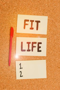Conceptual hand writing showing Fit Life. Business photo showcasing maintaining a healthy weight with diet and exercise Healthy living Empty sticker reminder memo billboard corkboard desk paper.
