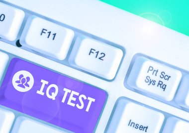 Word writing text Iq Test. Business concept for attempt to measure your cognitive ability huanalysis intelligence.