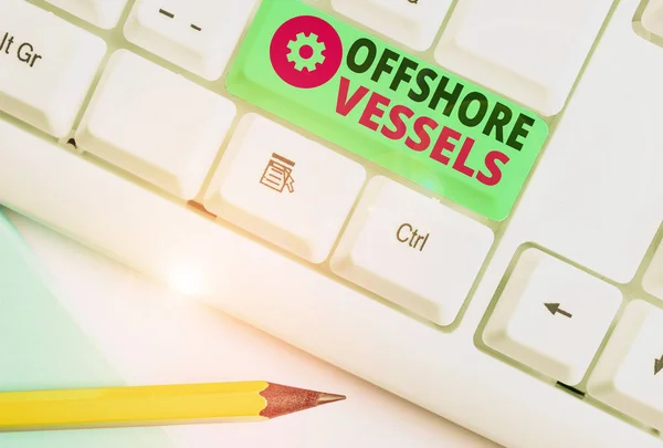 Texto escrito por palavra Offshore Vessels. Conceito de negócio para navios concebidos para fornecer plataformas offshore de petróleo e gás . — Fotografia de Stock