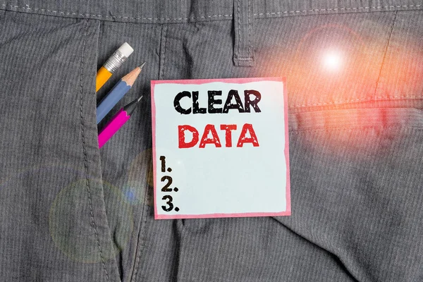 Writing note showing Clear Data. Business photo showcasing act of removing unwanted data or information in a storage disk Writing equipment and blue note paper in pocket of trousers. — Stock Photo, Image