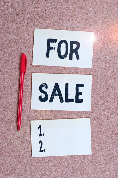 Conceptual hand writing showing For Sale. Business photo showcasing putting property house vehicle available to be bought by others Empty sticker reminder memo billboard corkboard desk paper. — 图库照片