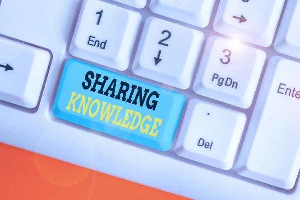 Writing note showing Sharing Knowledge. Business photo showcasing knowledge is exchanged among showing or organizations.
