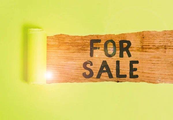 Word writing text For Sale. Business concept for putting property house vehicle available to be bought by others Cardboard which is torn in the middle placed above a wooden classic table. — Stok fotoğraf