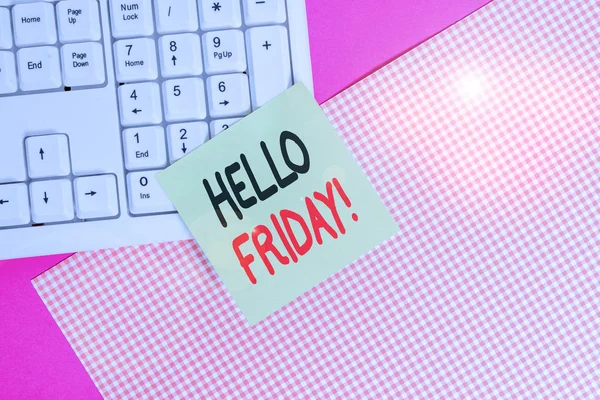 Text sign showing Hello Friday. Conceptual photo you say this for wishing and hoping another good lovely week Note paper stick to computer keyboard near colored gift wrap sheet on table. — Stock Photo, Image