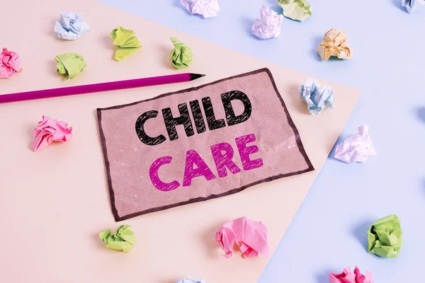 Handwriting text writing Child Care. Concept meaning a care of children especially as a service while parents at work Colored crumpled papers empty reminder blue yellow background clothespin. — Stock Photo, Image
