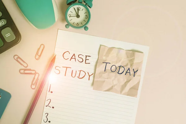 Text sign showing Case Study. Conceptual photo research methodology that has commonly used in social sciences Calculator clips clock clipboard mouse sheet note pencil color background.