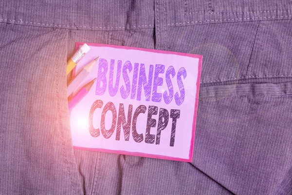 Text sign showing Business Concept. Conceptual photo approach to marketing or delivering an existing product Writing equipment and purple note paper inside pocket of man work trousers. — Stok fotoğraf