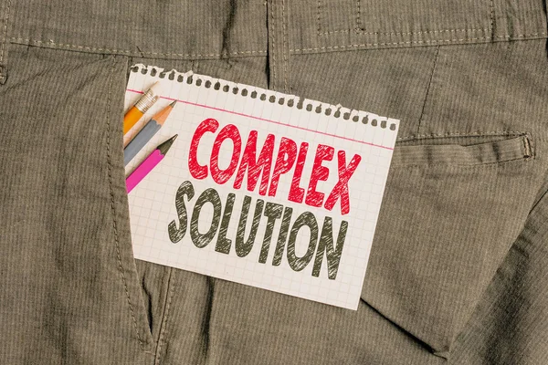 Conceptual hand writing showing Complex Solution. Business photo text significant ideas that are completely or partly repressed Writing equipment and white note paper inside pocket of trousers. — Stockfoto