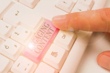 Handwriting text writing Engaging Content. Concept meaning provides value to the lives of your potential clients.