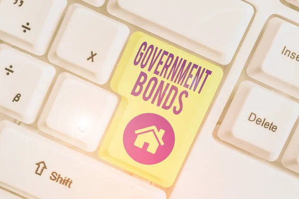 Handwriting text writing Government Bonds. Concept meaning debt security issued by a government to support spending. — Stock Photo, Image