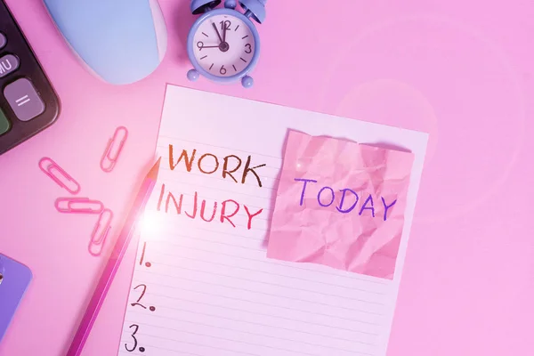 Text sign showing Work Injury. Conceptual photo illness caused by events or exposures in the work environment Calculator clips clock clipboard mouse sheet note pencil color background.