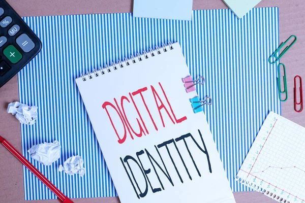 Writing note showing Digital Identity. Business photo showcasing networked identity adopted or claimed in cyberspace Striped paperboard notebook cardboard office study supplies chart paper. — Stok fotoğraf