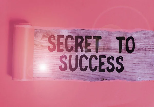 Word writing text Secret To Success. Business concept for Unexplained attainment of fame wealth or social status Cardboard which is torn in the middle placed above a wooden classic table. — 图库照片
