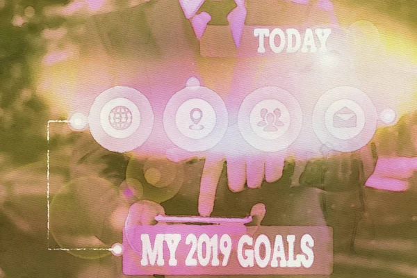 Text sign showing My 2019 Goals. Conceptual photo setting up demonstratingal goals or plans for the current year Picture photo system network scheme modern technology smart device.