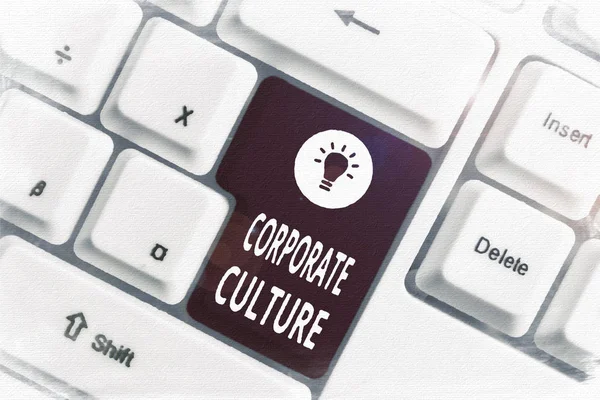 Conceptual hand writing showing Corporate Culture. Business photo text pervasive values and attitudes that characterize a company White pc keyboard with note paper above the white background.