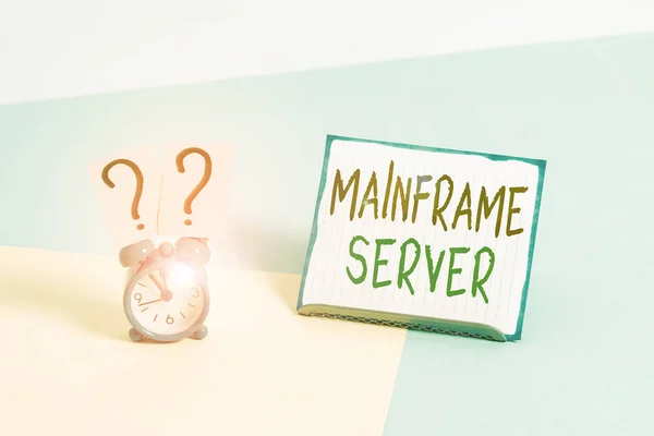 Conceptual hand writing showing Mainframe Server. Business photo text designed for processing large amounts of information Alarm clock beside a Paper sheet placed on pastel backdrop.